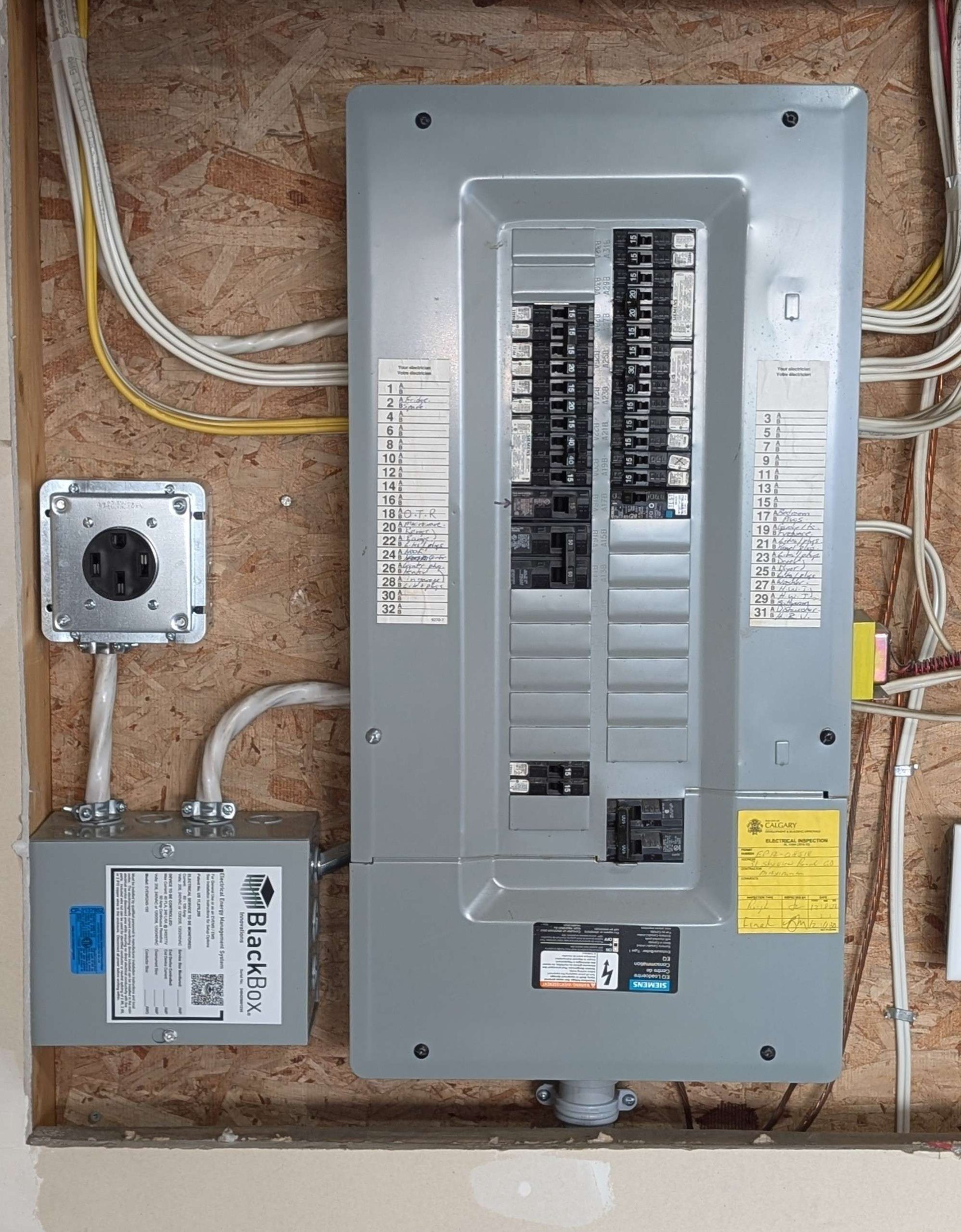 100 Amp Load Manager with 14-50 EV Charging Plug in Calgary Garage